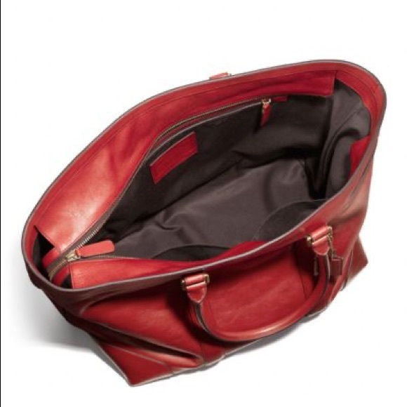 This is a smart looking authentic used Coach Bleeker Legacy Weekender Tote - Picture 5 of 5